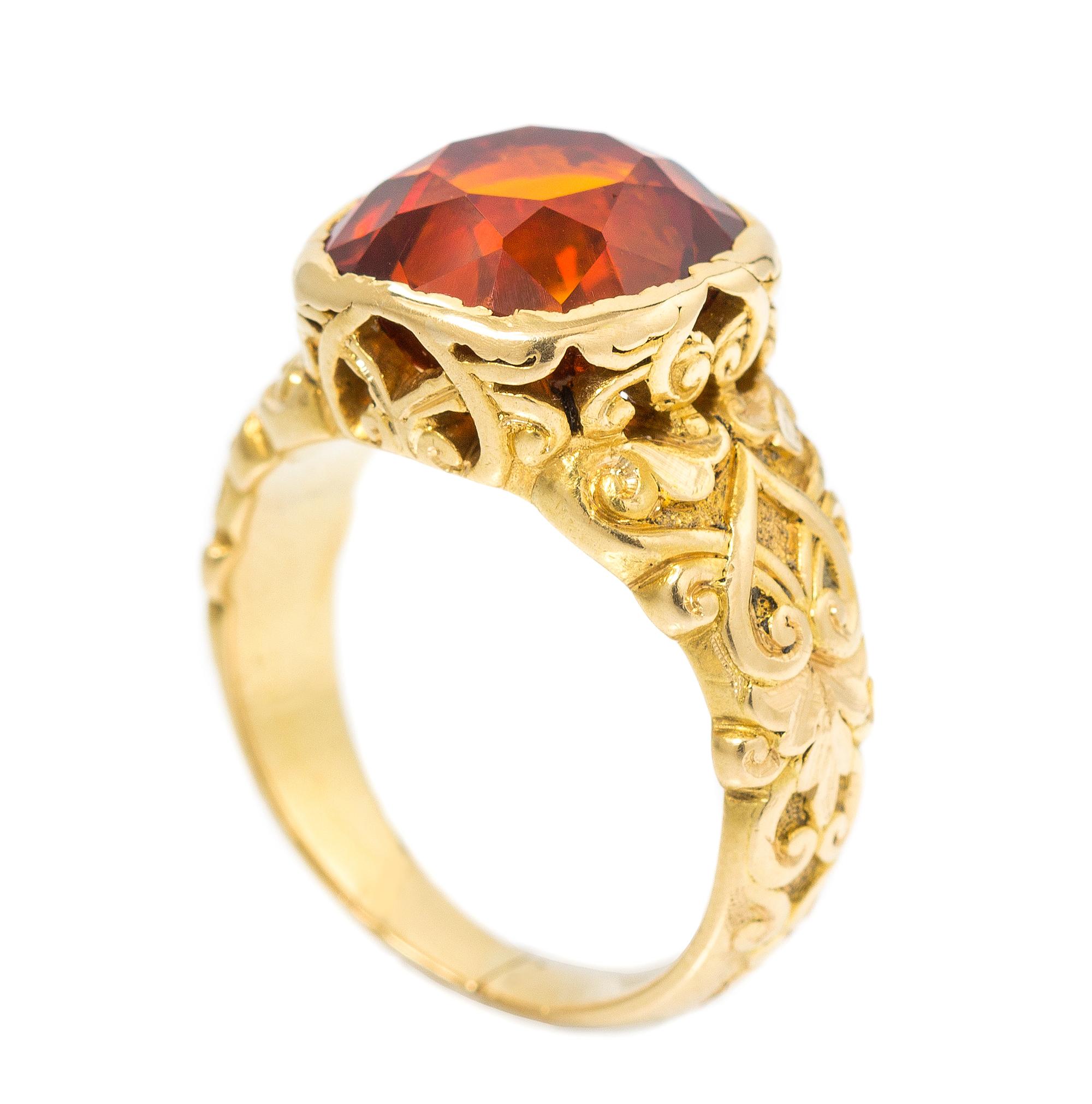 An 18 Karat Yellow Gold, Onyx, and Diamond Ring 4.20 dwts.