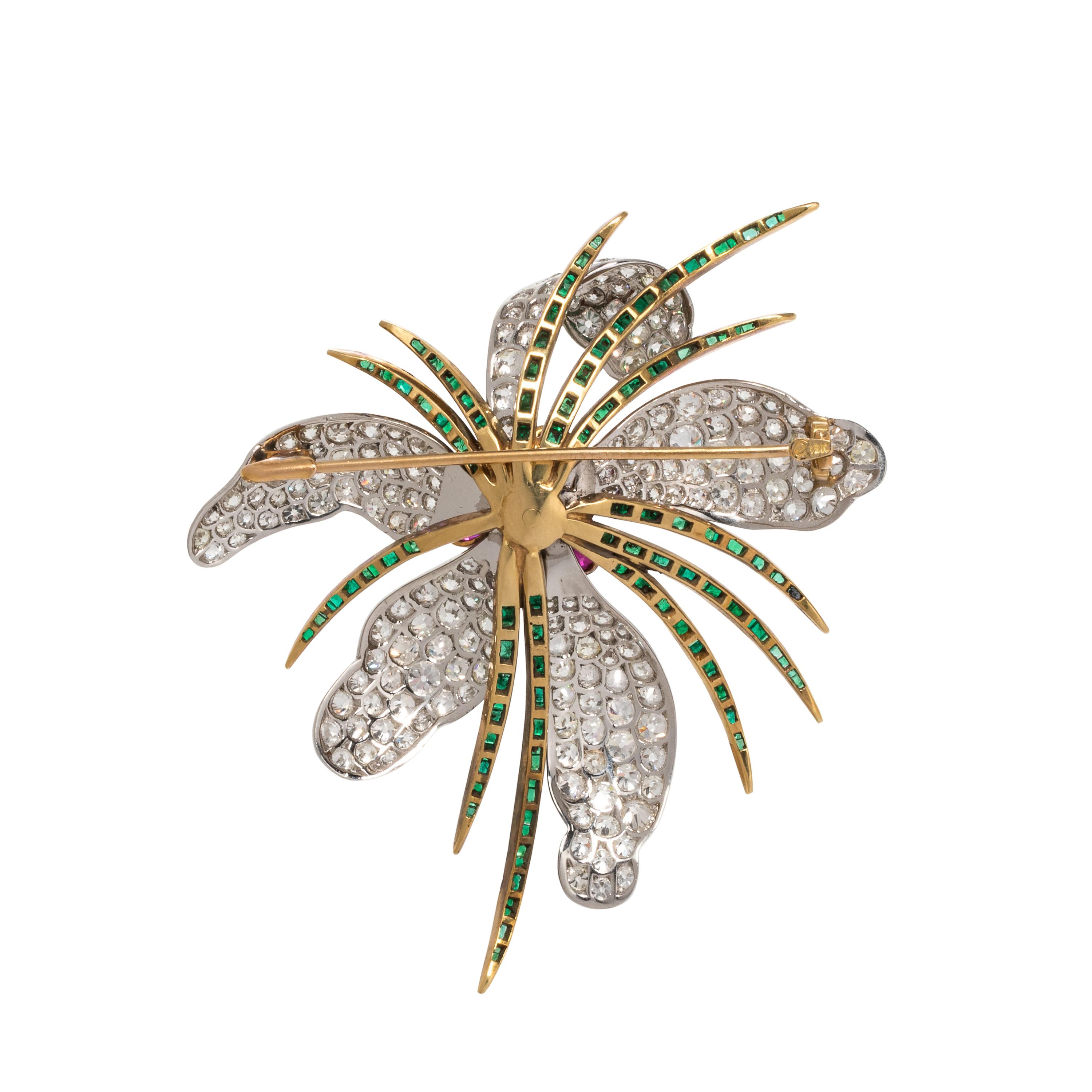EVELYN CLOTHIER, DIAMOND, RUBY AND EMERALD FLOWER BROOCH