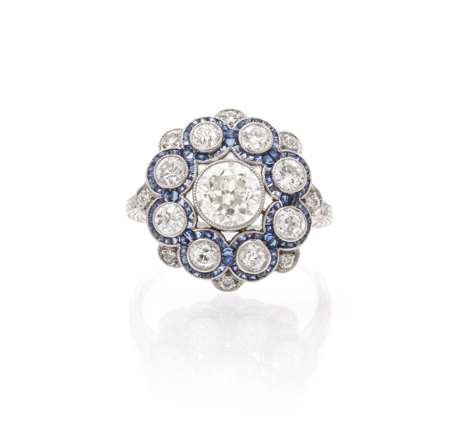 An Edwardian Platinum, Diamond and Sapphire Ring, 3.00 dwts.