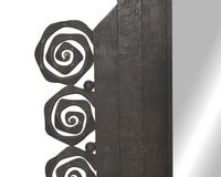 A French Art Deco wrought iron mirror, signed "Denand," circa 1930