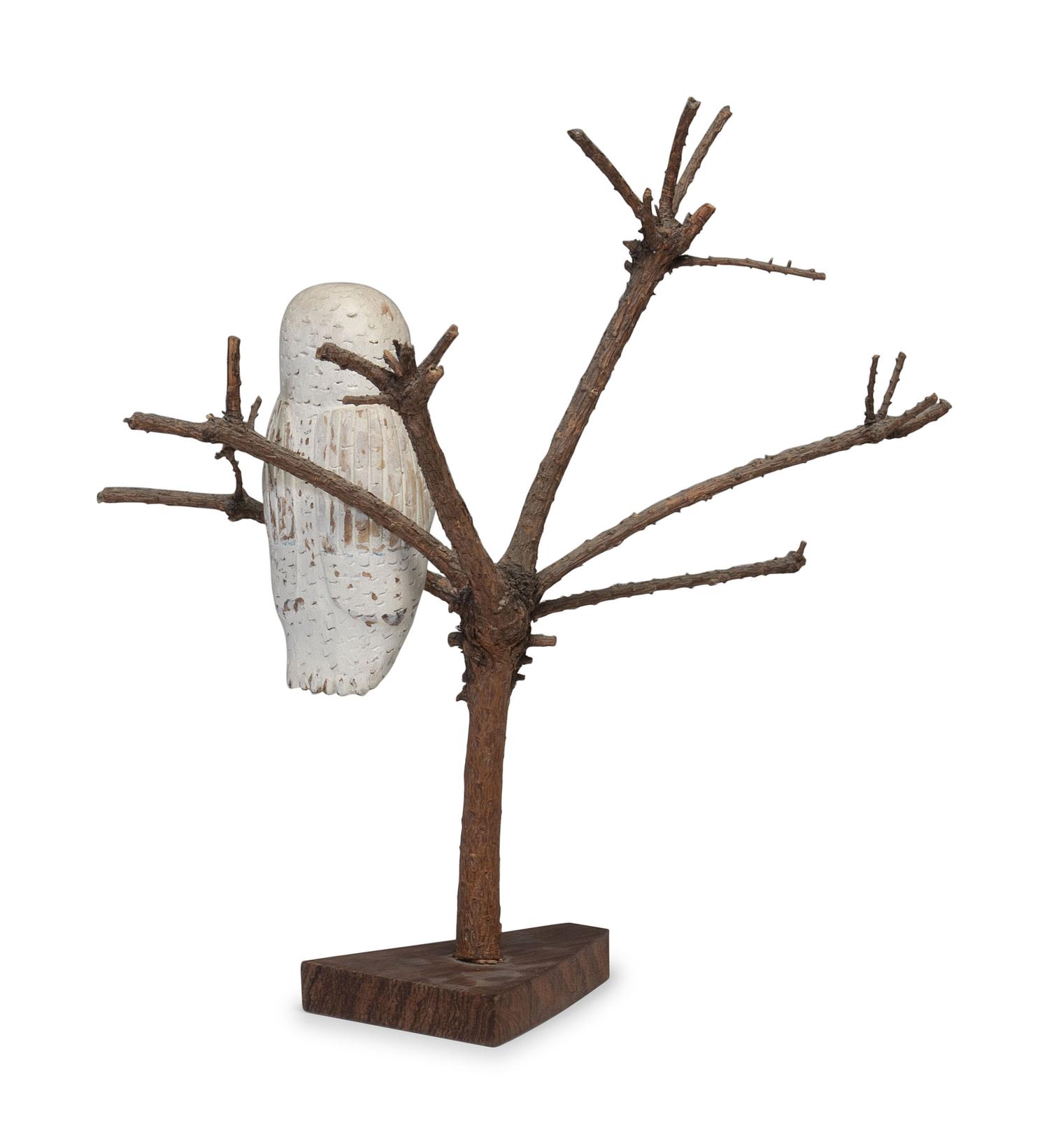 A Folk Art Carving of a Snowy Owl Perched in Tree