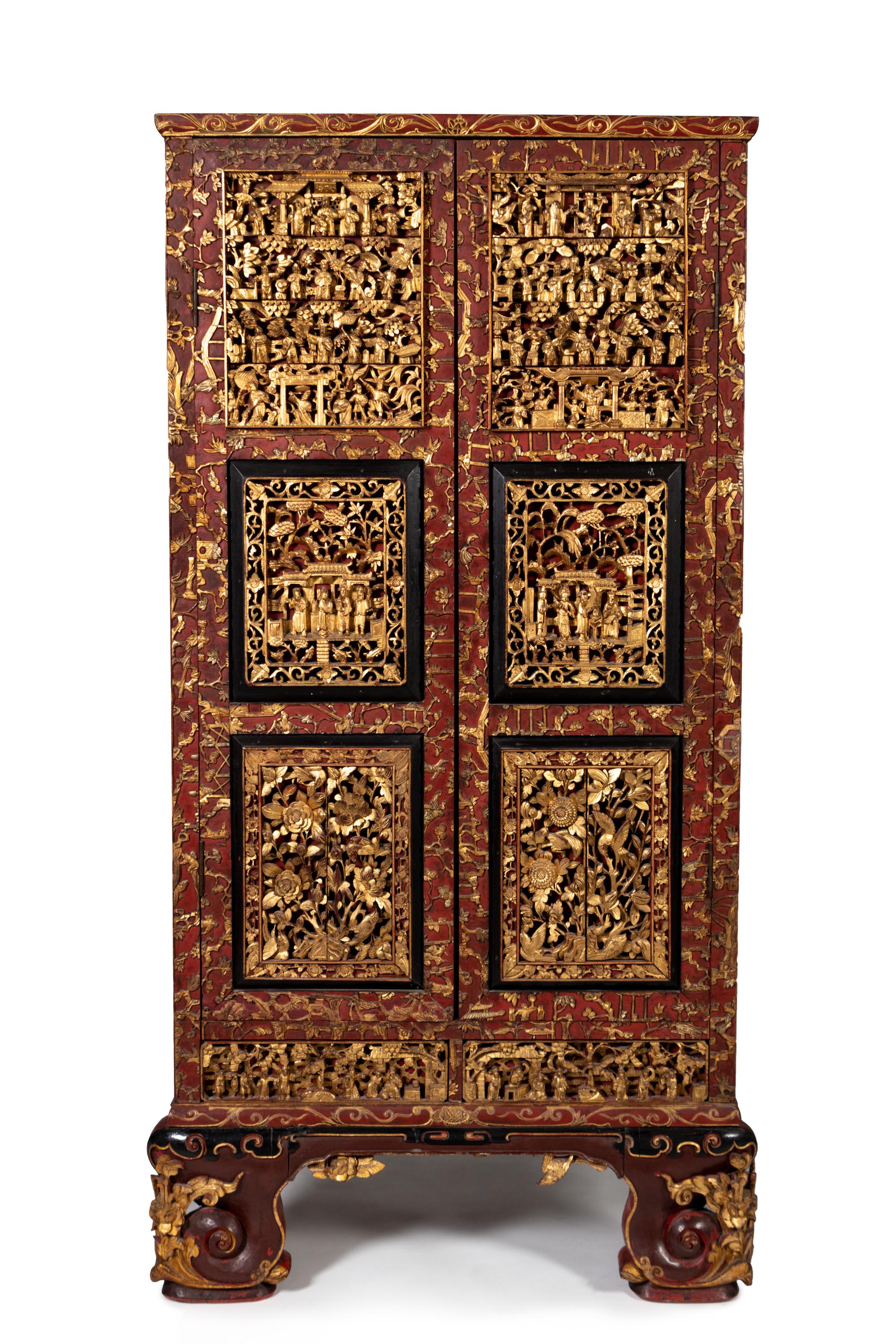 A Chinese Parcel-Gilt and Red-Painted Cabinet
