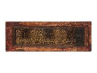 A Tibetan Gilt Lacquered and Polychromed Wood Manuscript Cover