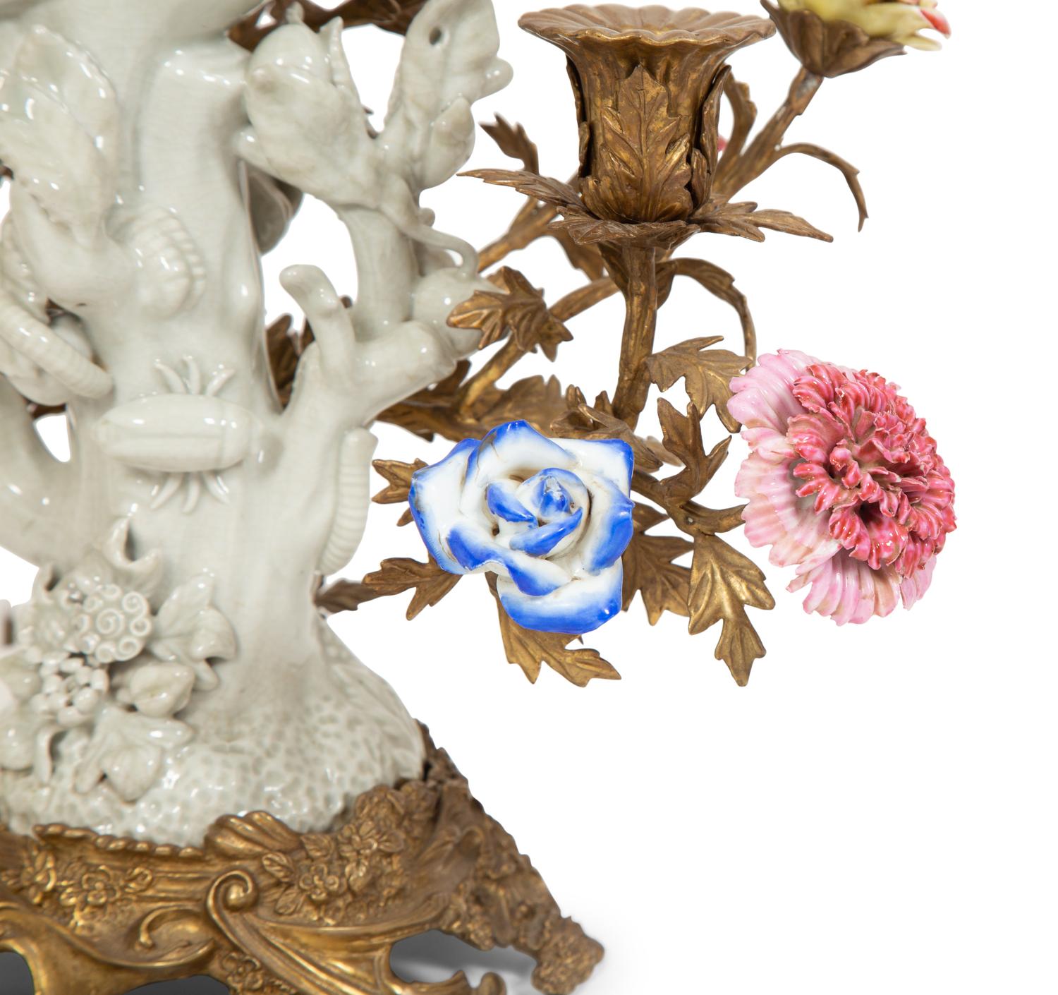 A Pair of Gilt Bronze and Porcelain Three-Light Candelabra