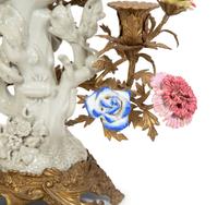 A Pair of Gilt Bronze and Porcelain Three-Light Candelabra