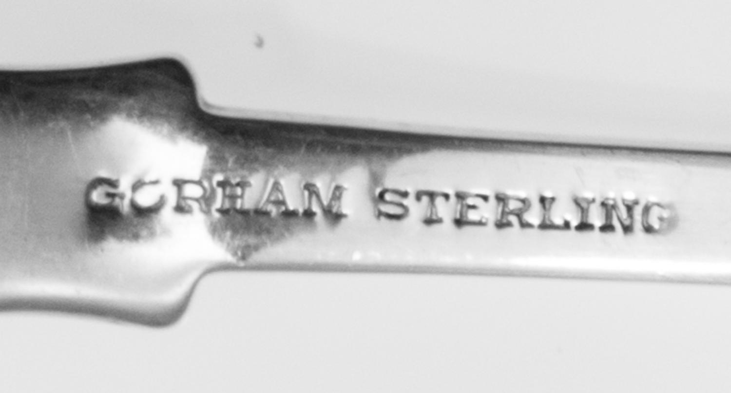 An American Silver Flatware Service, Gorham Mfg. Co., Providence, RI, Old English Tipt pattern, comprising: 12 dinner knives 12 luncheo