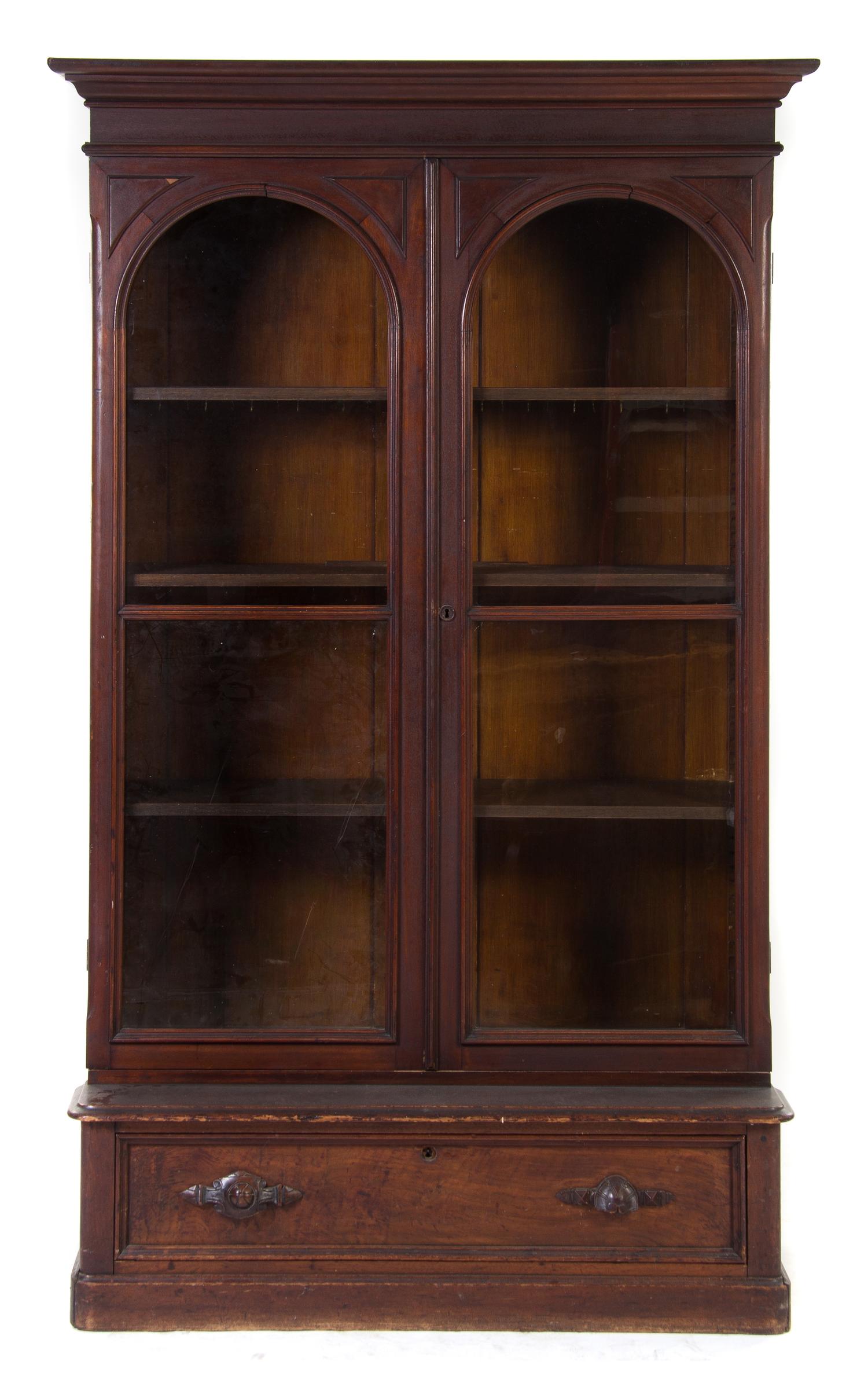 A Victorian Walnut Bookcase Height 78 3/4 x width 48 x depth 18 1/2 inches. — 19TH CENTURY