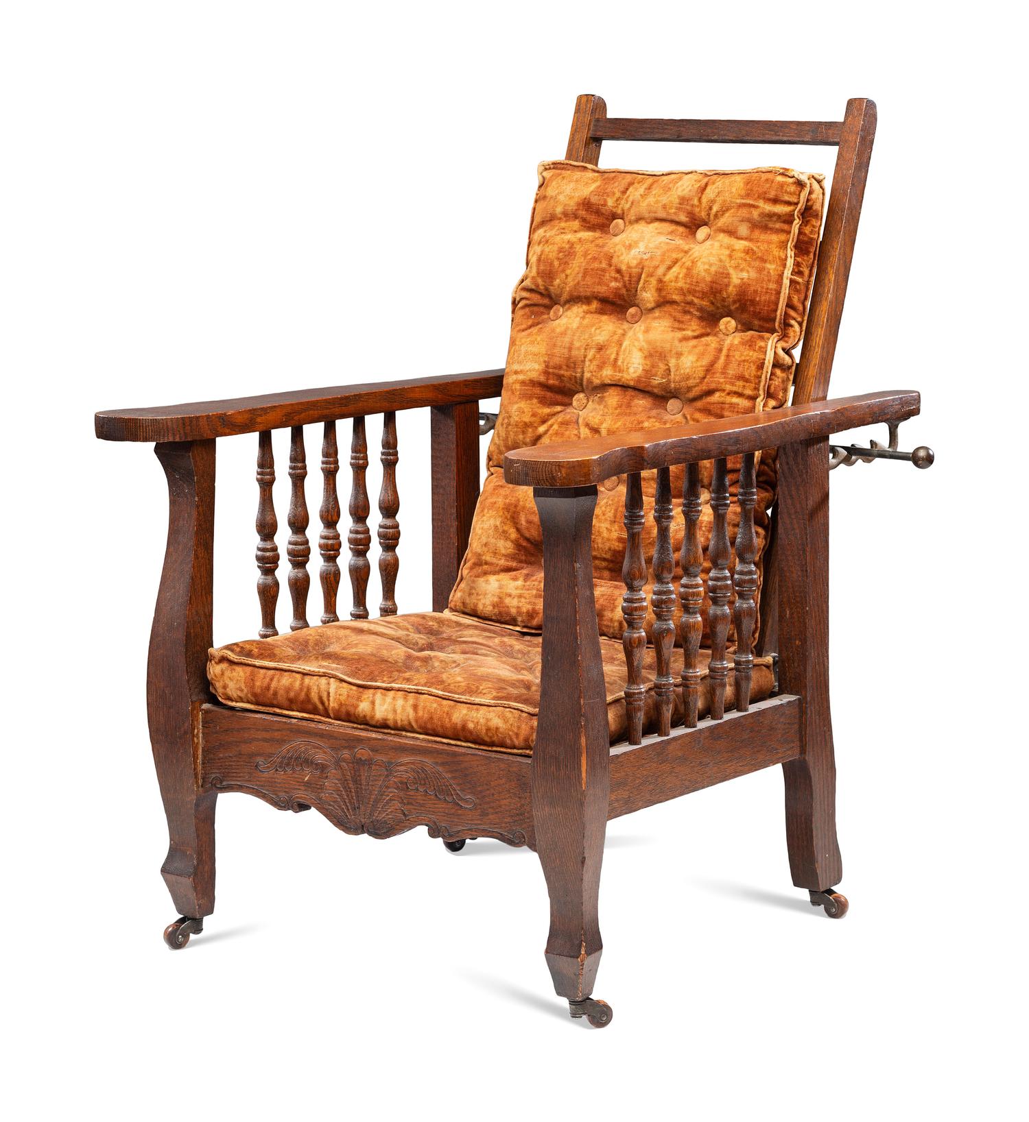 A Victorian Carved Mahogany and Tufted Velvet Upholstered Child's Reclining Armchair