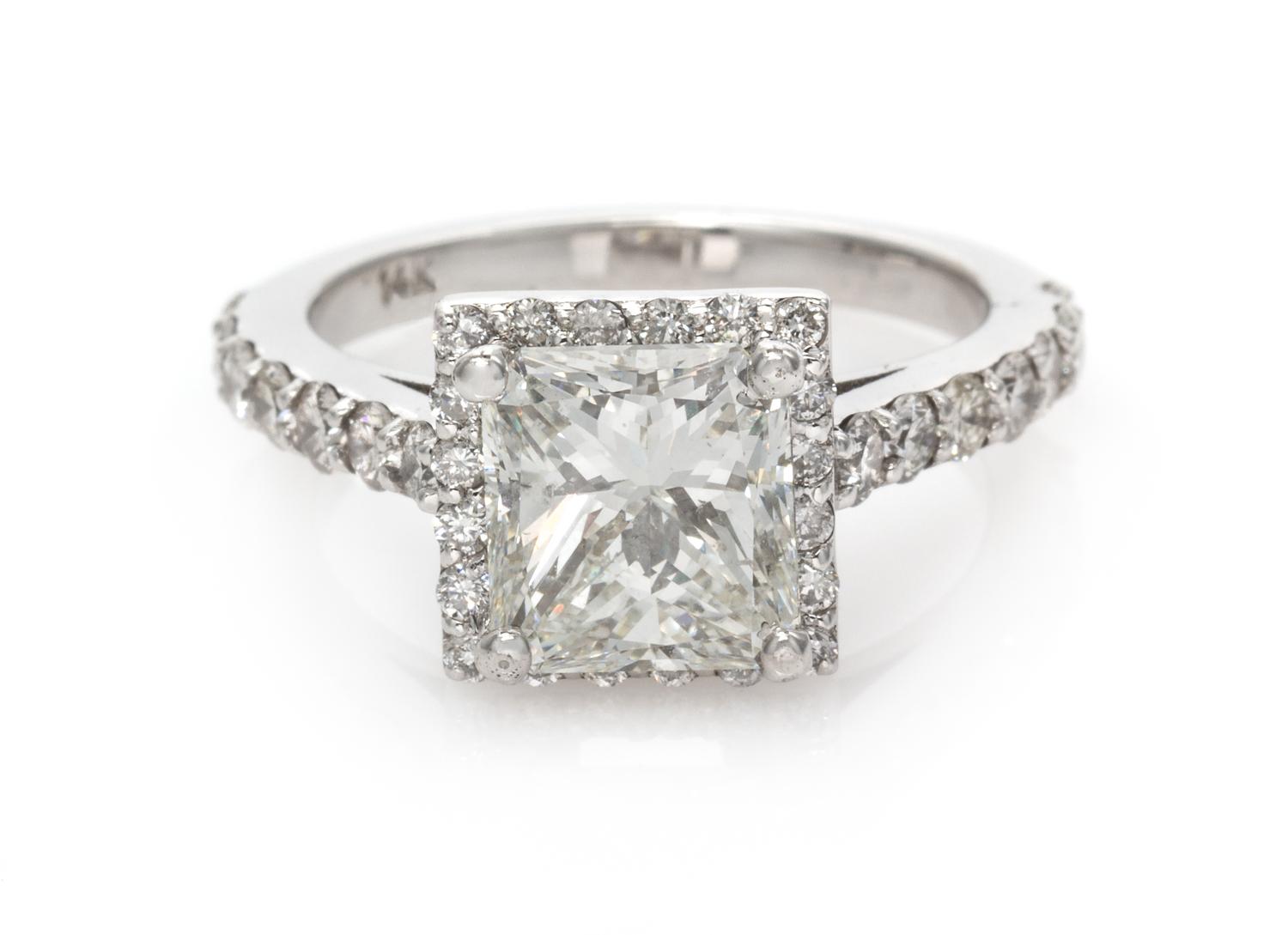 A 14 Karat White Gold and Diamond Ring, 3.35 dwts.