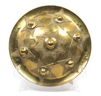 A Southeast Asian Brass Shield Diameter 11 3/4 inches.