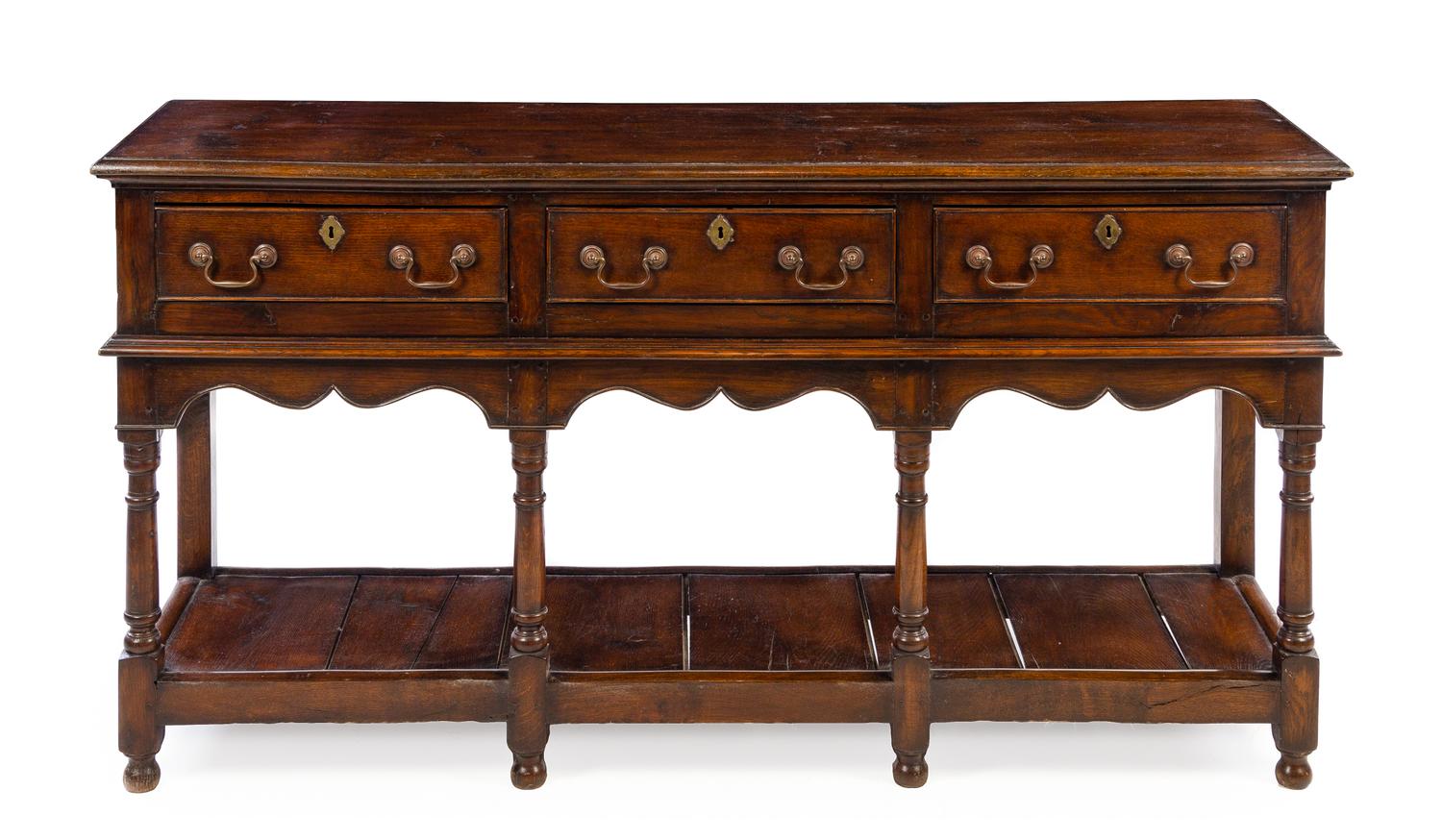 A Welsh Provincial Oak Server Height 32 1/2 x width 64 x depth 17 inches. — 19TH CENTURY