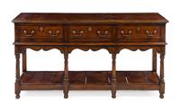 A Welsh Provincial Oak Server Height 32 1/2 x width 64 x depth 17 inches. — 19TH CENTURY