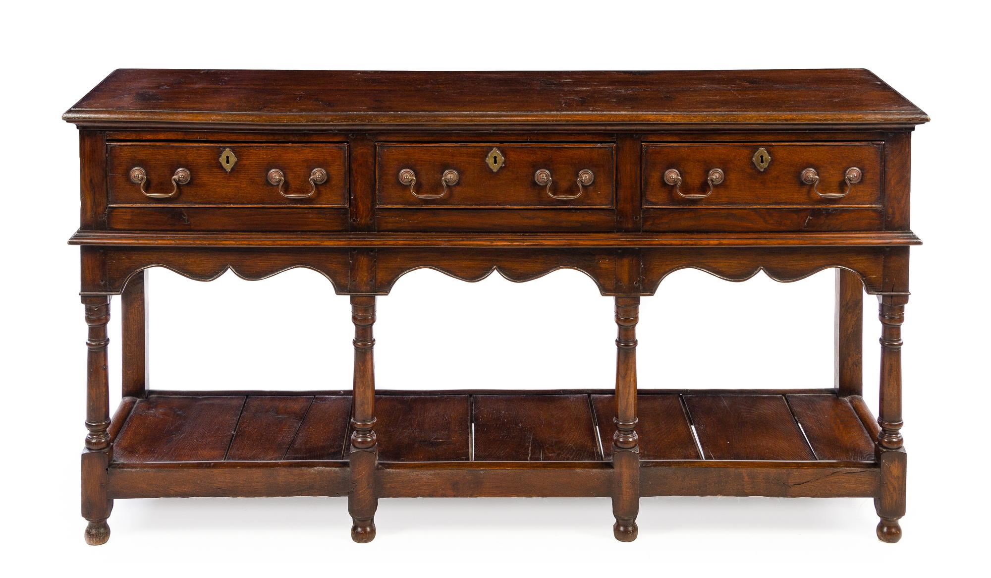 A Welsh Provincial Oak Server Height 32 1/2 x width 64 x depth 17 inches. — 19TH CENTURY