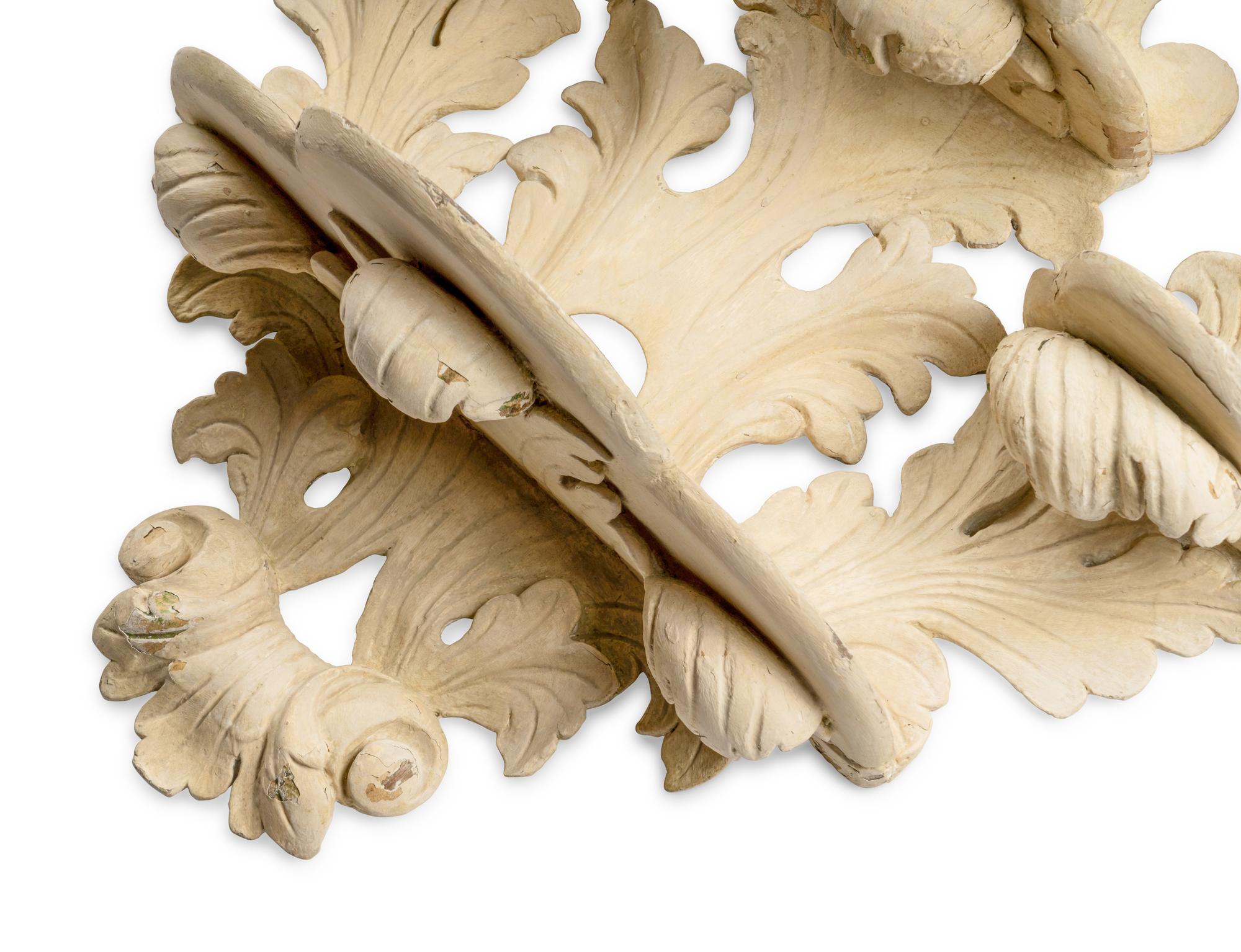 A Pair of Northern European Cream-Painted Brackets
