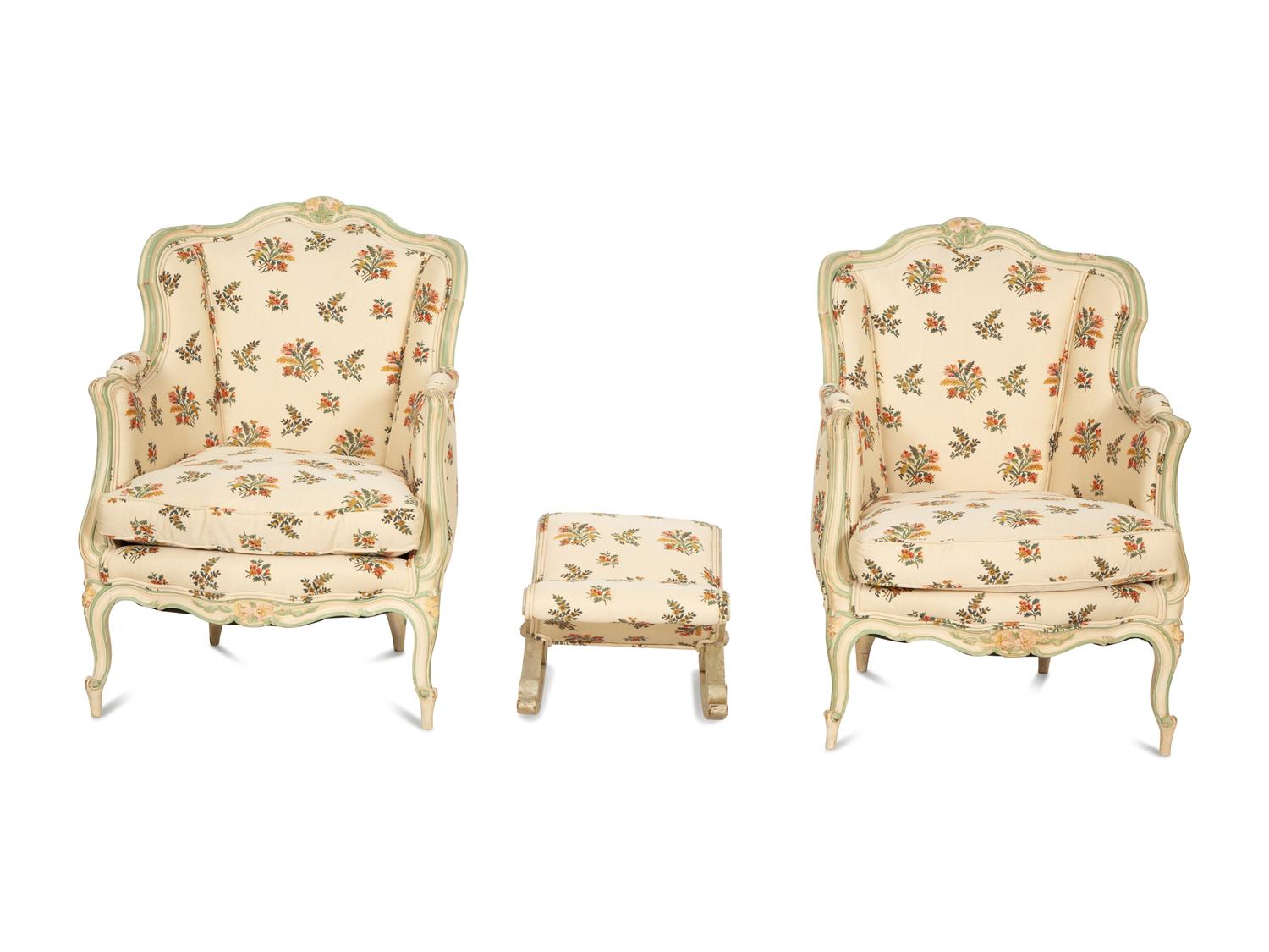 A Pair of Louis XV Style Painted Wingback Bergères and an Associated Stool