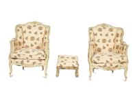A Pair of Louis XV Style Painted Wingback Bergères and an Associated Stool