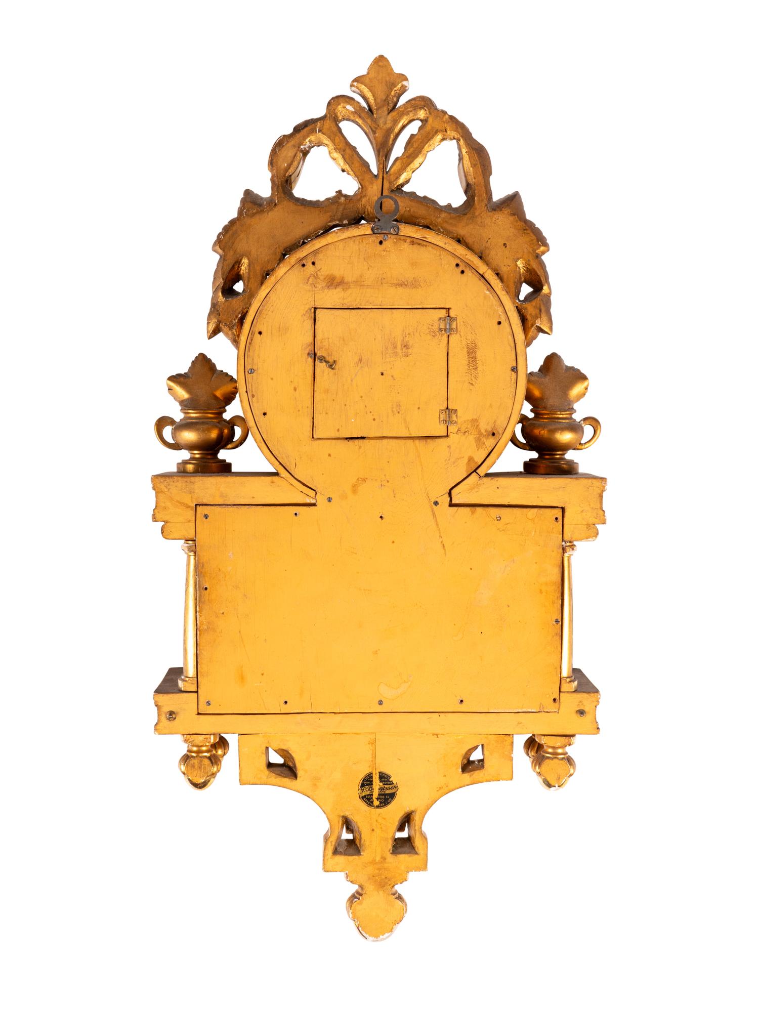 A Gustavian Style Giltwood Wall Clock