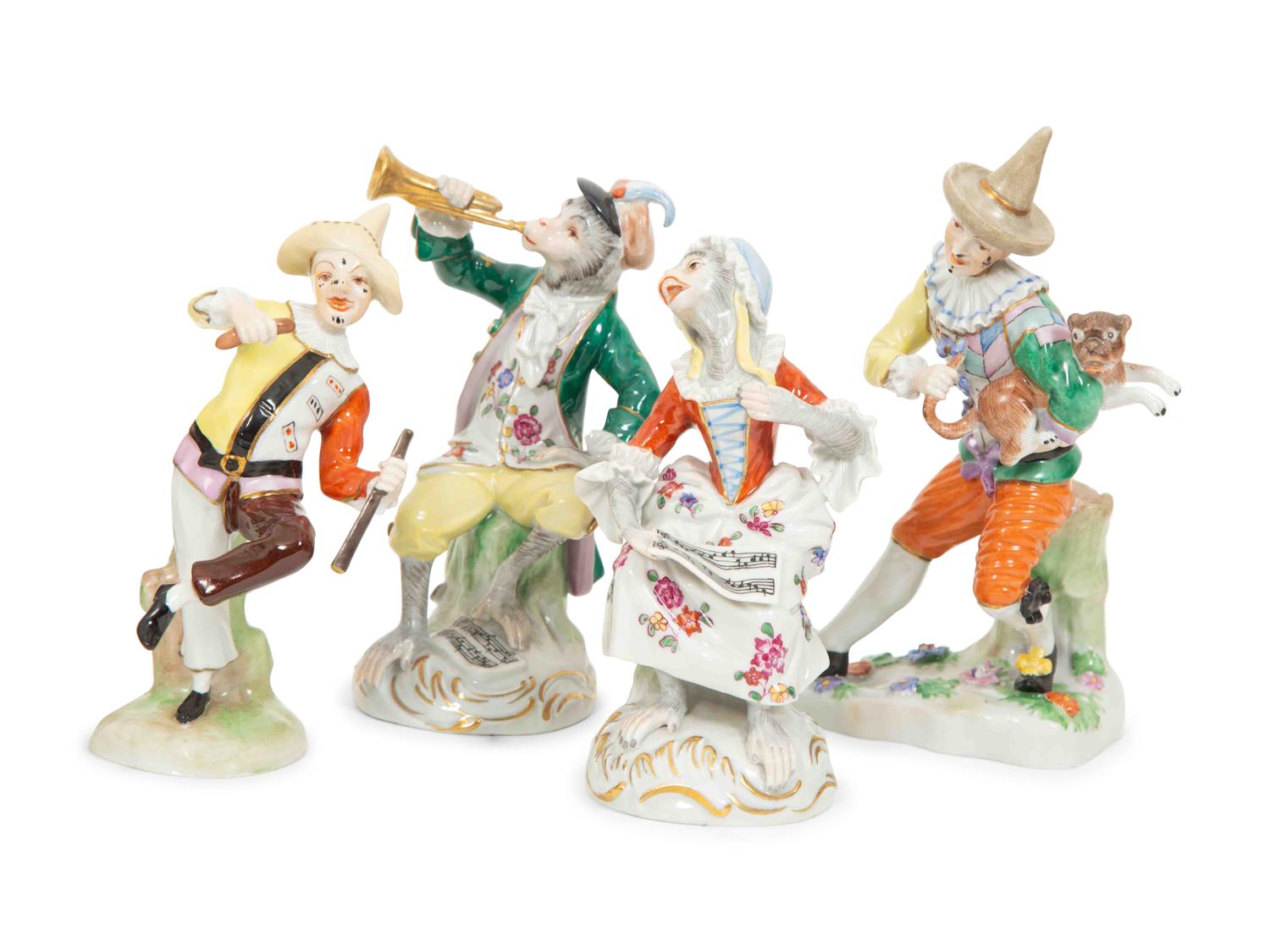 A Large Group of Meissen and Dresden Porcelain Figures