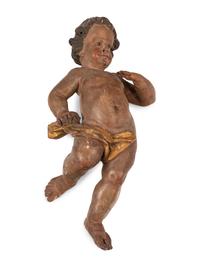 A Painted and Parcel Gilt Wood Figure of a Putto