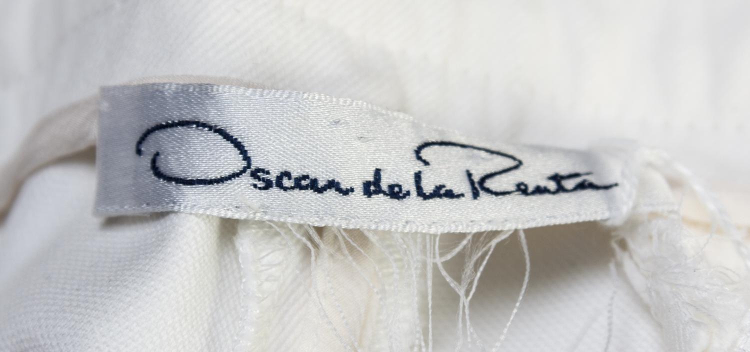 An Oscar de la Renta White Cotton Pant Ensemble, Pant size 10. Sweater set size S.