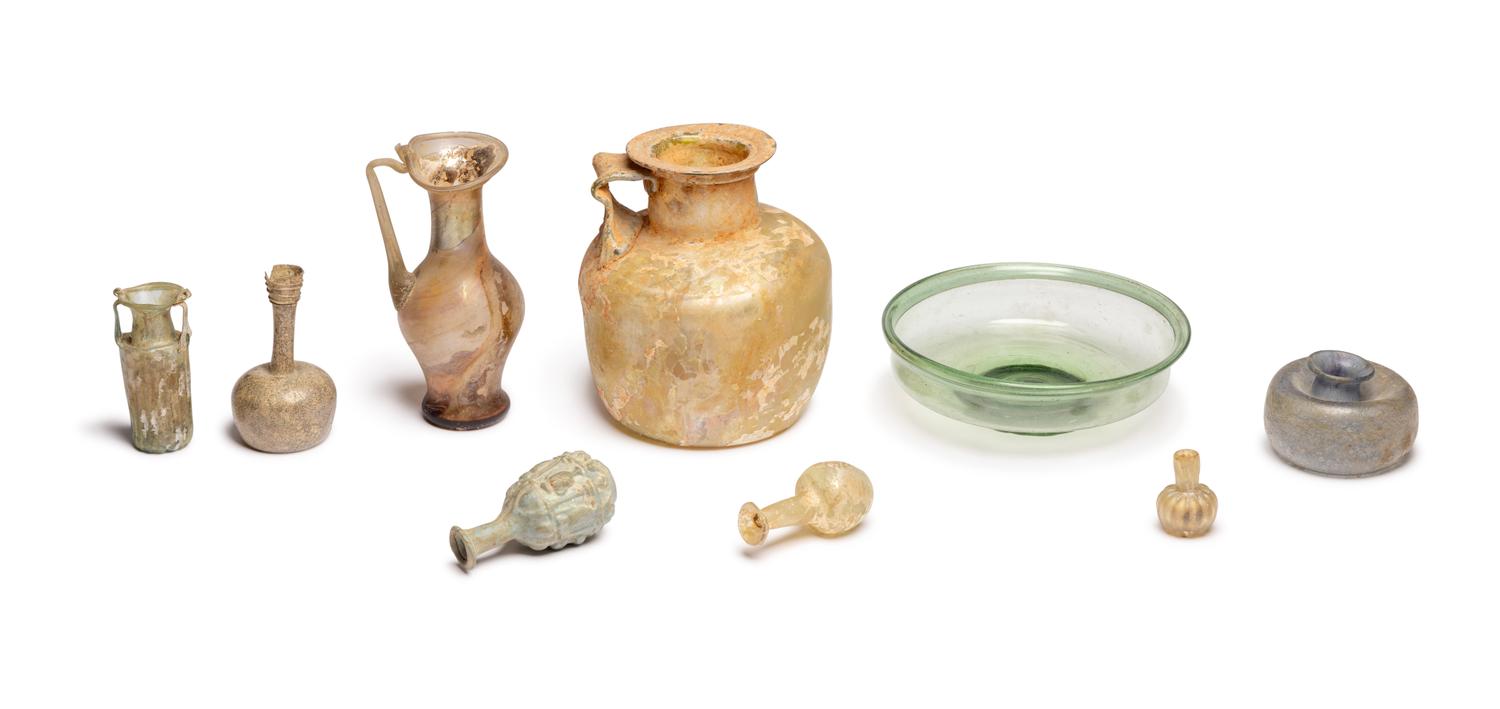 A Group of Nine Roman, Sidonian, and Islamic Glass Vessels