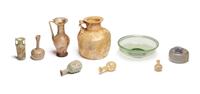 A Group of Nine Roman, Sidonian, and Islamic Glass Vessels