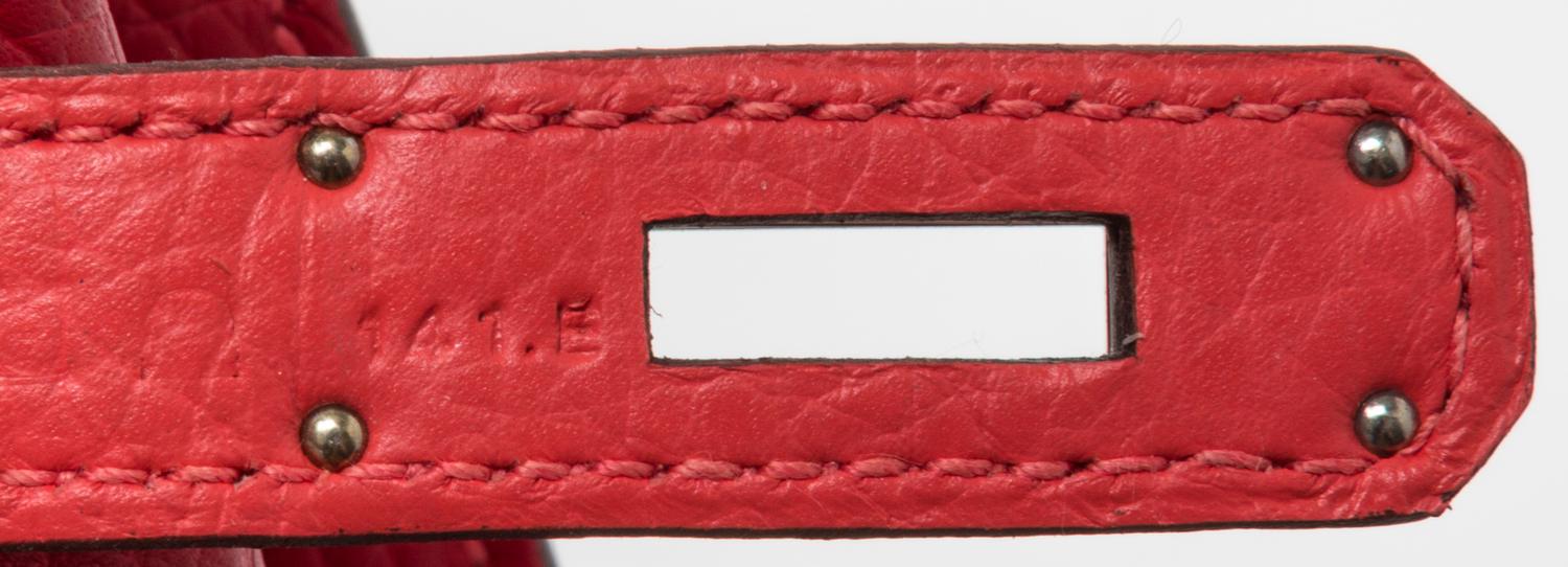 An Hermes Rouge Casaque Taurillon Clemence 22cm So-Kelly Handbag, 9" x 11" x 4.5".