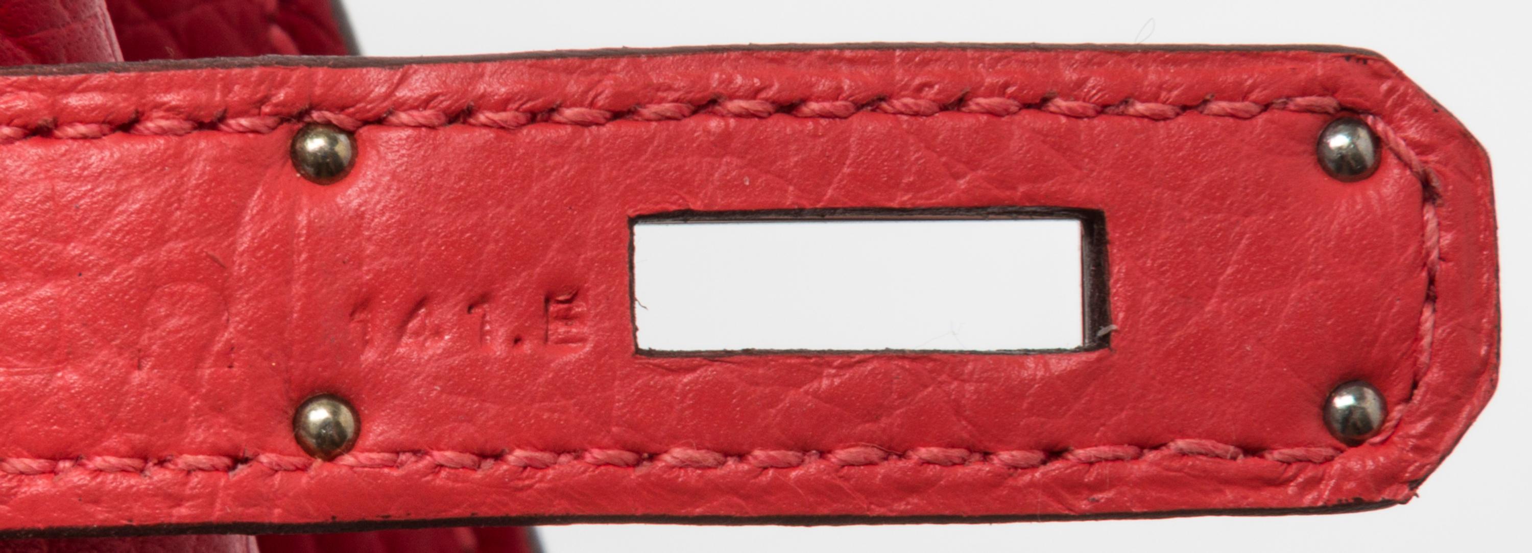 An Hermes Rouge Casaque Taurillon Clemence 22cm So-Kelly Handbag, 9" x 11" x 4.5".
