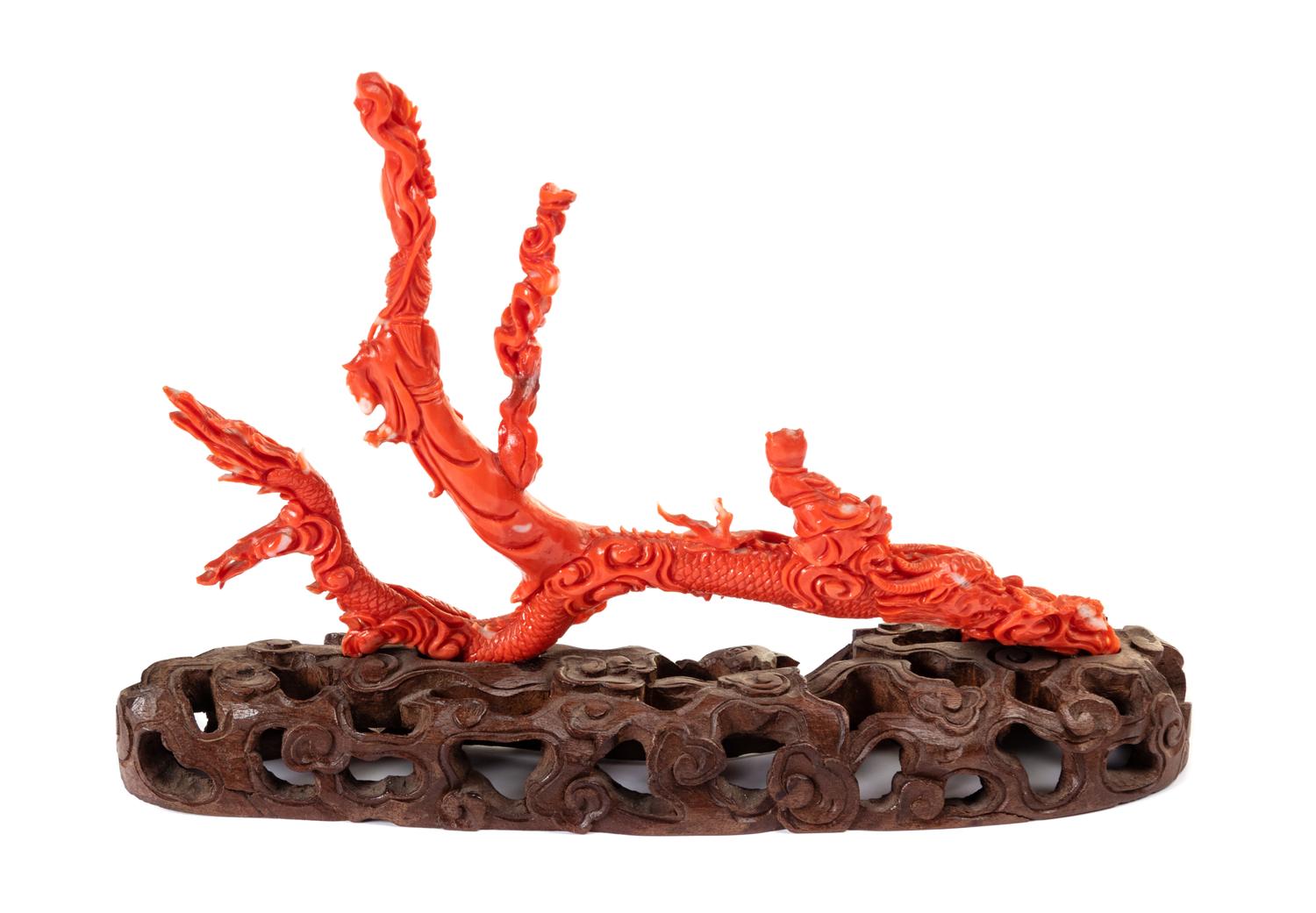 A Chinese Carved Coral Figural Group
