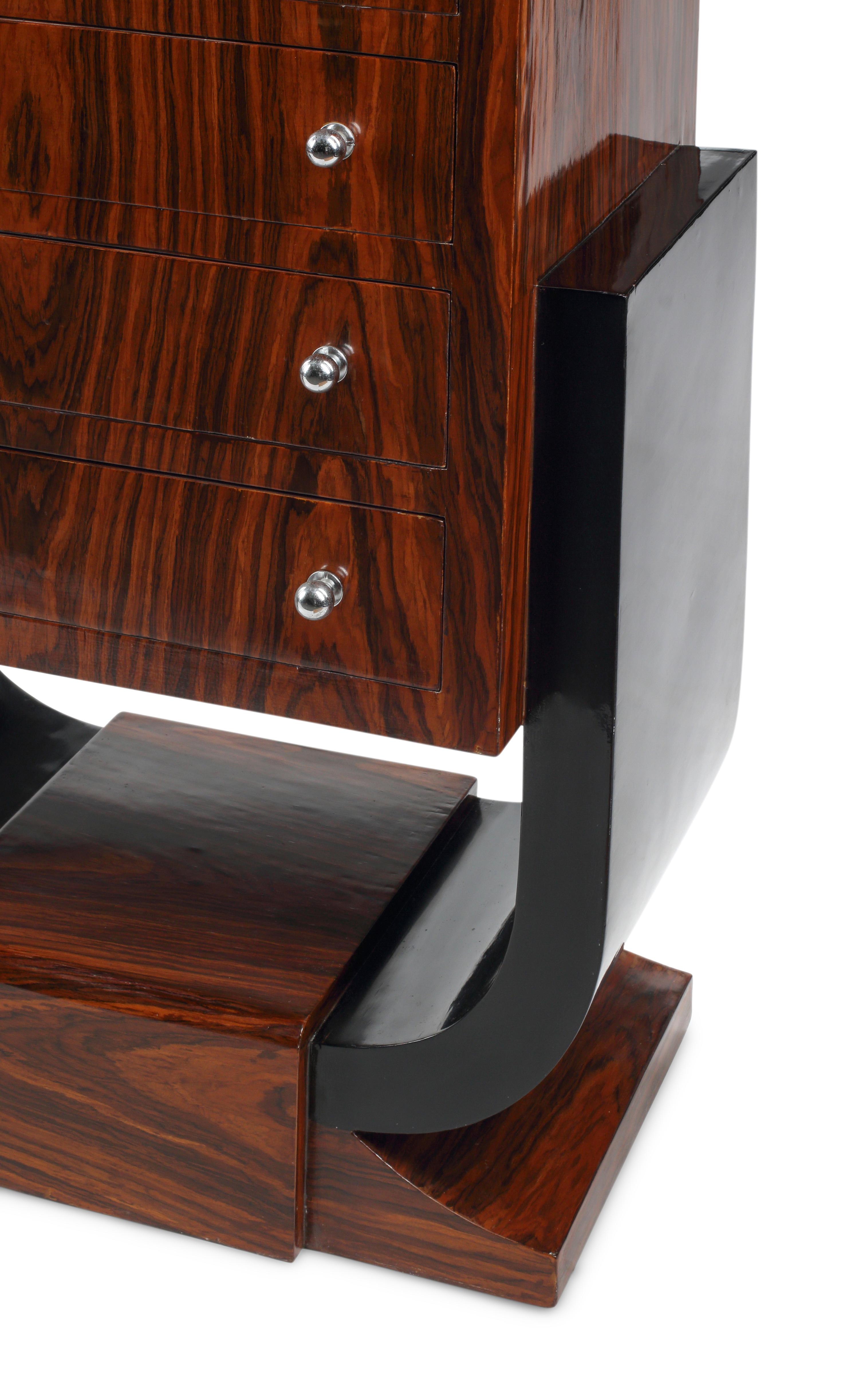 A Pair of Art Deco Style Part-Ebonized Rosewood Tall Chests of Drawers