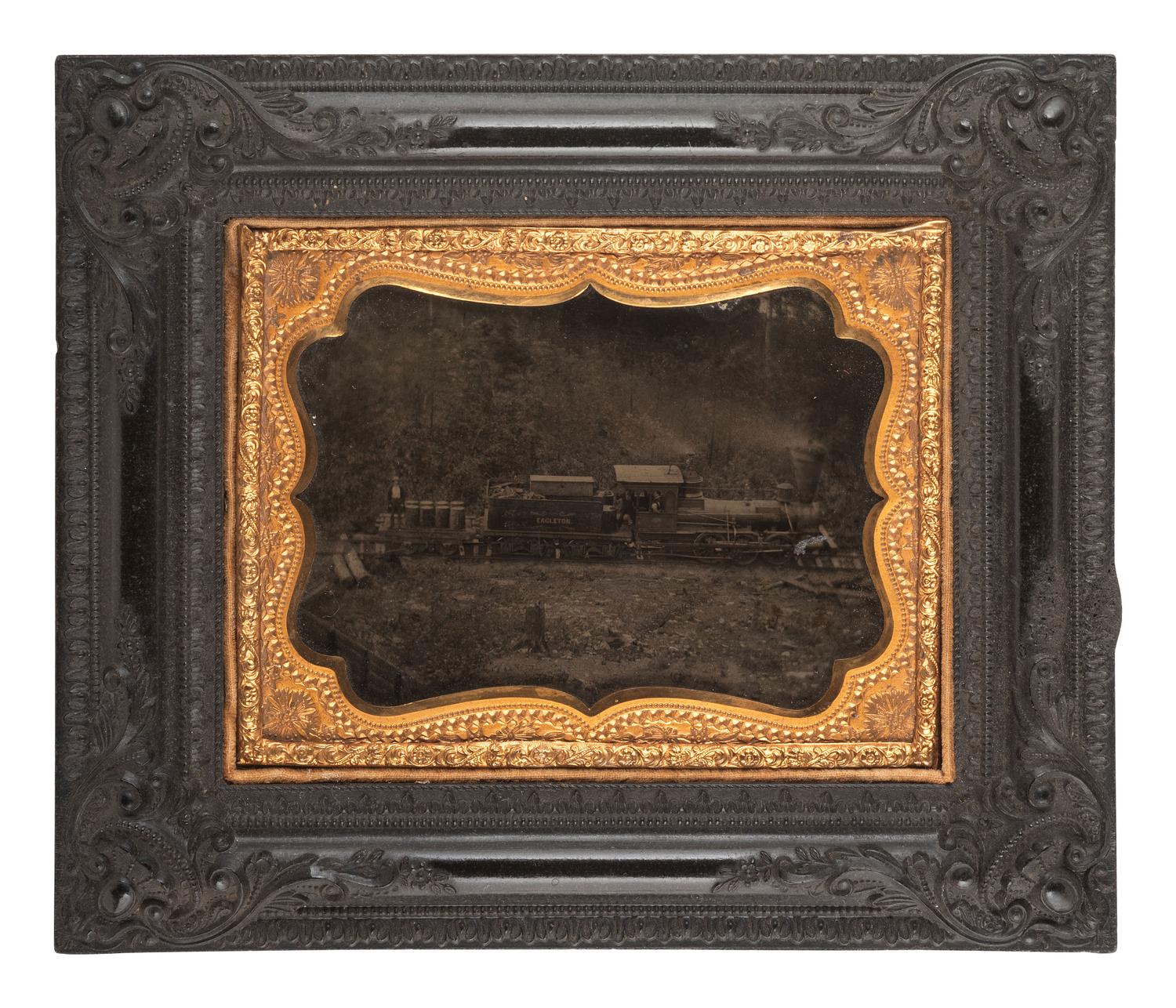 [EARLY PHOTOGRAPHY]. Quarter plate ambrotype of a train engine and tender marked "Eagleton," likely on its way to or from the Eagleton mine camp in Central Pennsylvania.