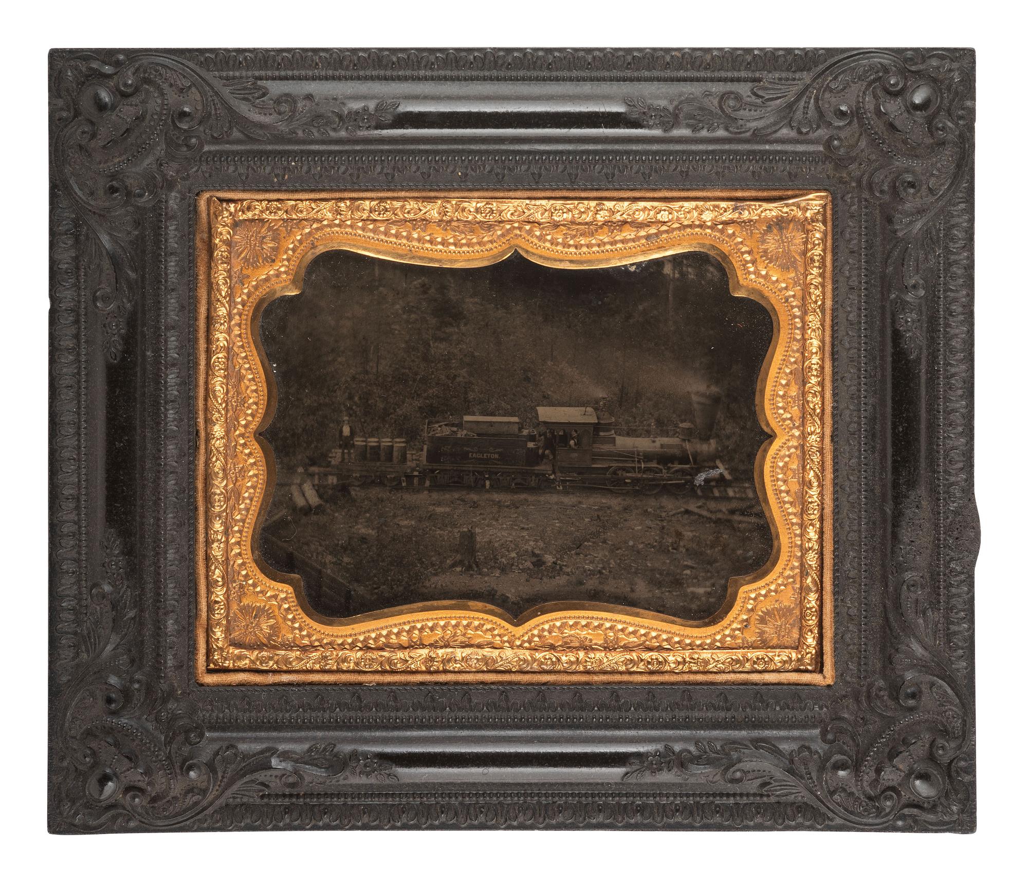 [EARLY PHOTOGRAPHY]. Quarter plate ambrotype of a train engine and tender marked "Eagleton," likely on its way to or from the Eagleton mine camp in Central Pennsylvania.