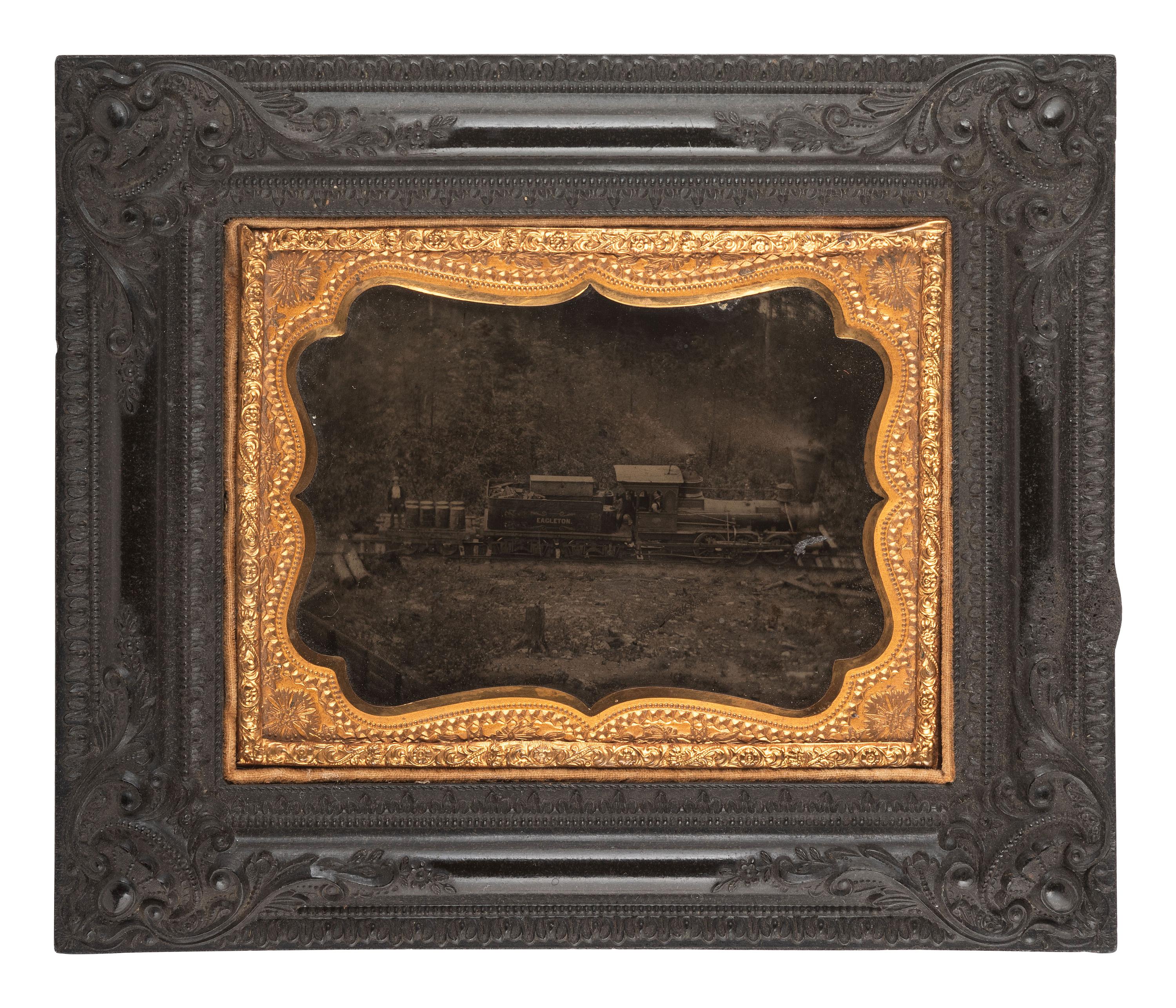 [EARLY PHOTOGRAPHY]. Quarter plate ambrotype of a train engine and tender marked "Eagleton," likely on its way to or from the Eagleton mine camp in Central Pennsylvania.