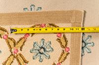 A Needlepoint Wool Rug