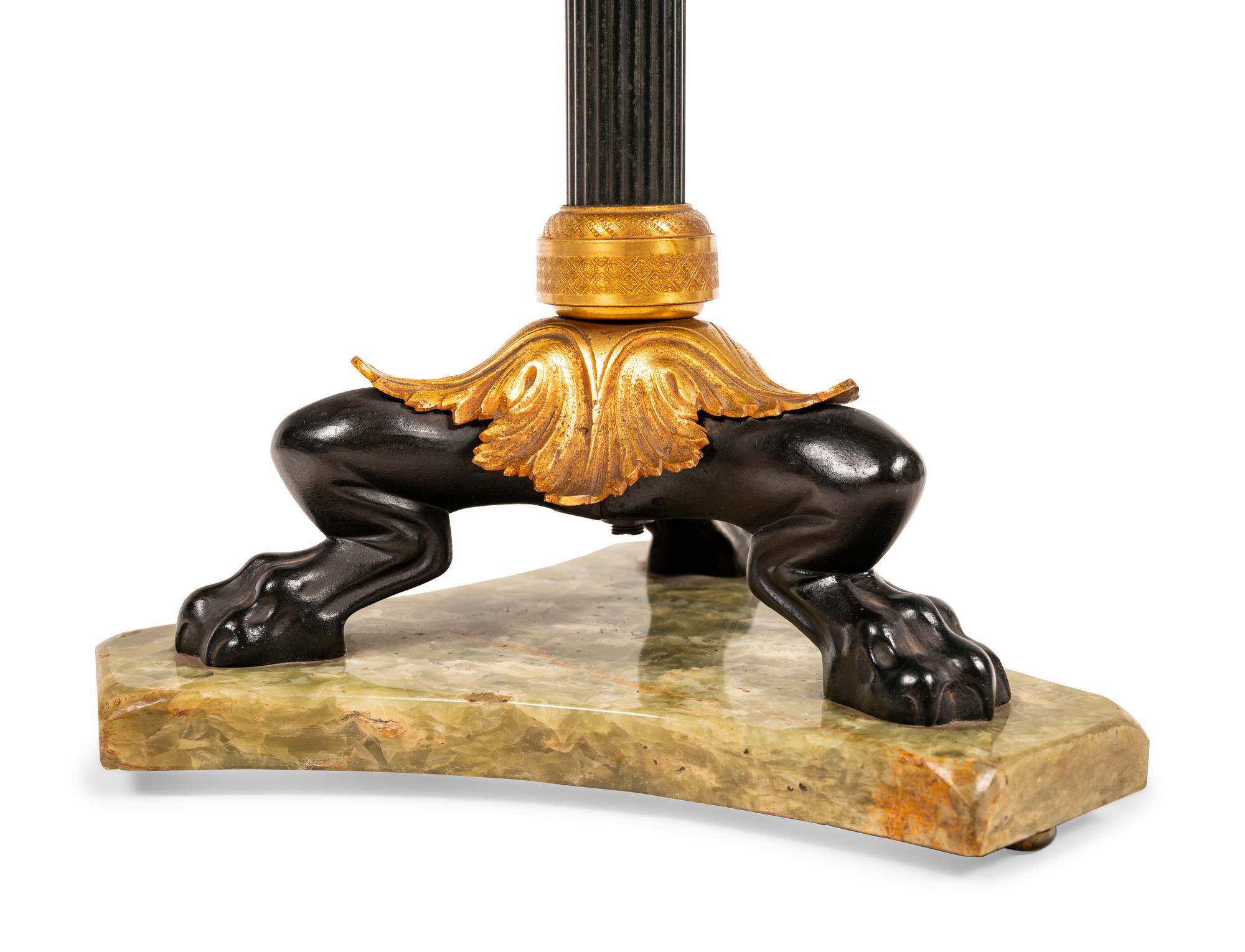 An Empire Style Gilt and Patinated Bronze and Onyx Side Table
