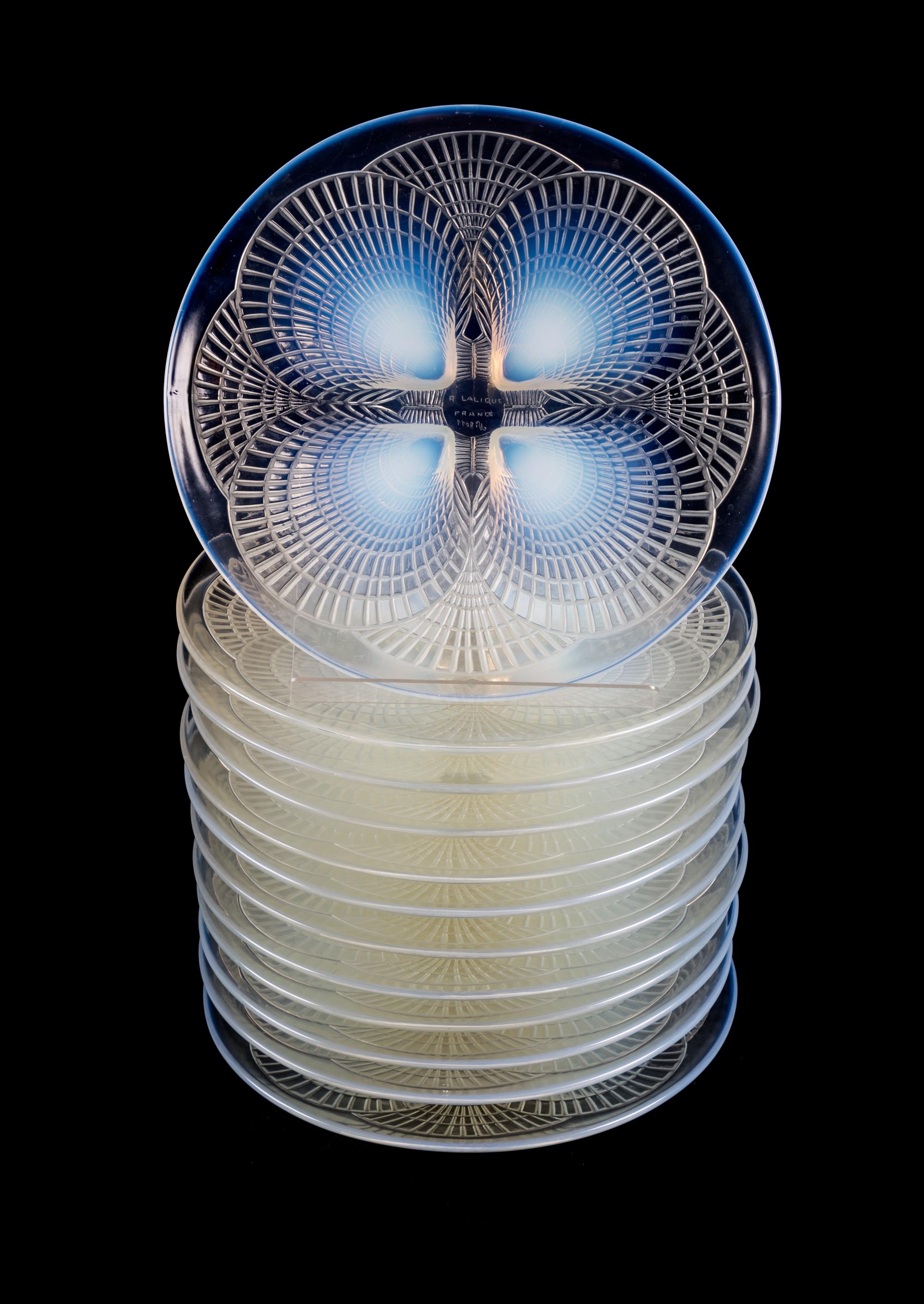 Rene Lalique, (French, 1860-1945), a set of 12 Coquilles dinner plates, no. 3011