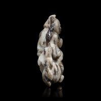 A Chinese Greyish Jade Figure of a Boy, Qing Dynasty — 清 灰玉童子佩