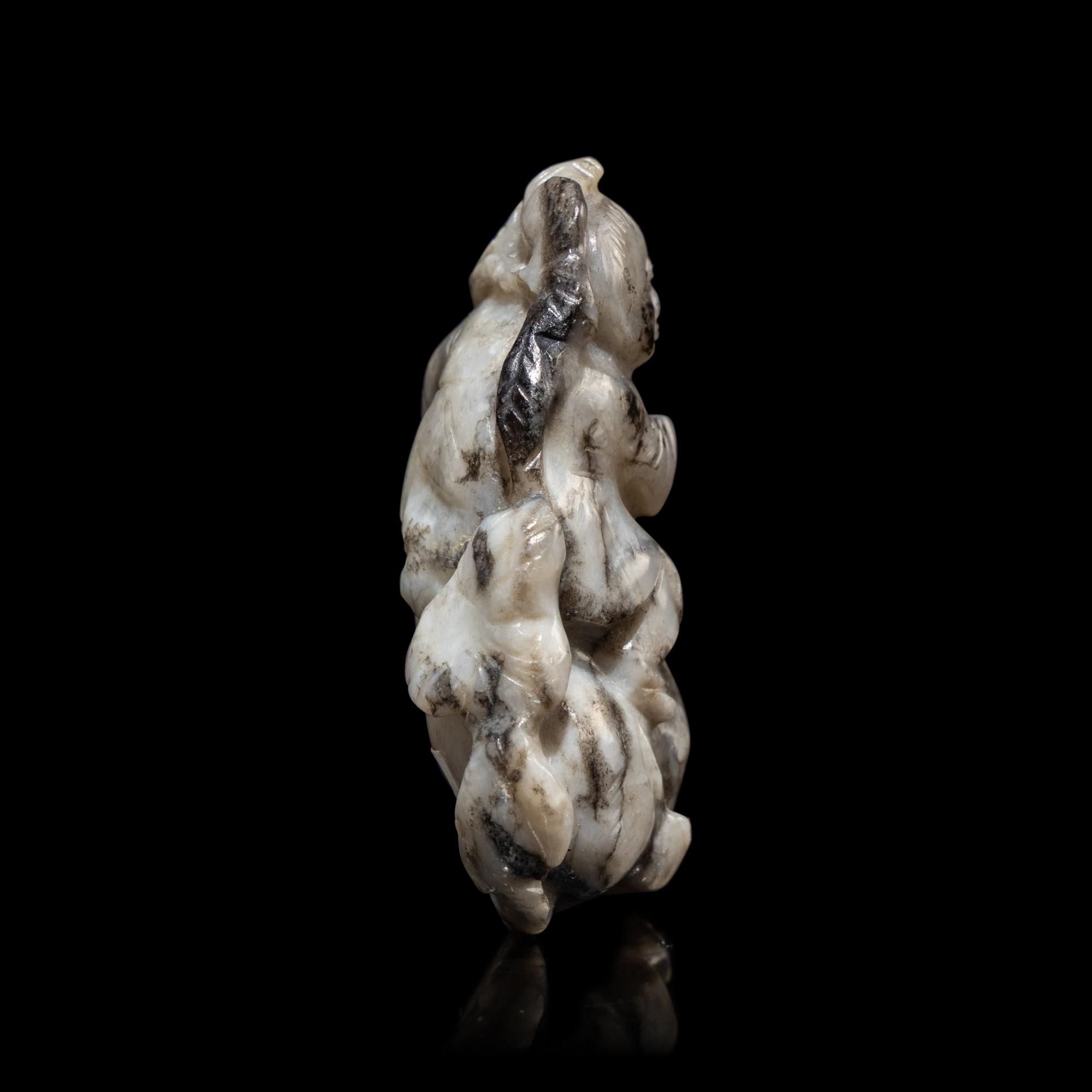 A Chinese Greyish Jade Figure of a Boy, Qing Dynasty — 清 灰玉童子佩