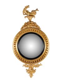 A George III Carved Giltwood Sea Dragon Bull's Eye Mirror