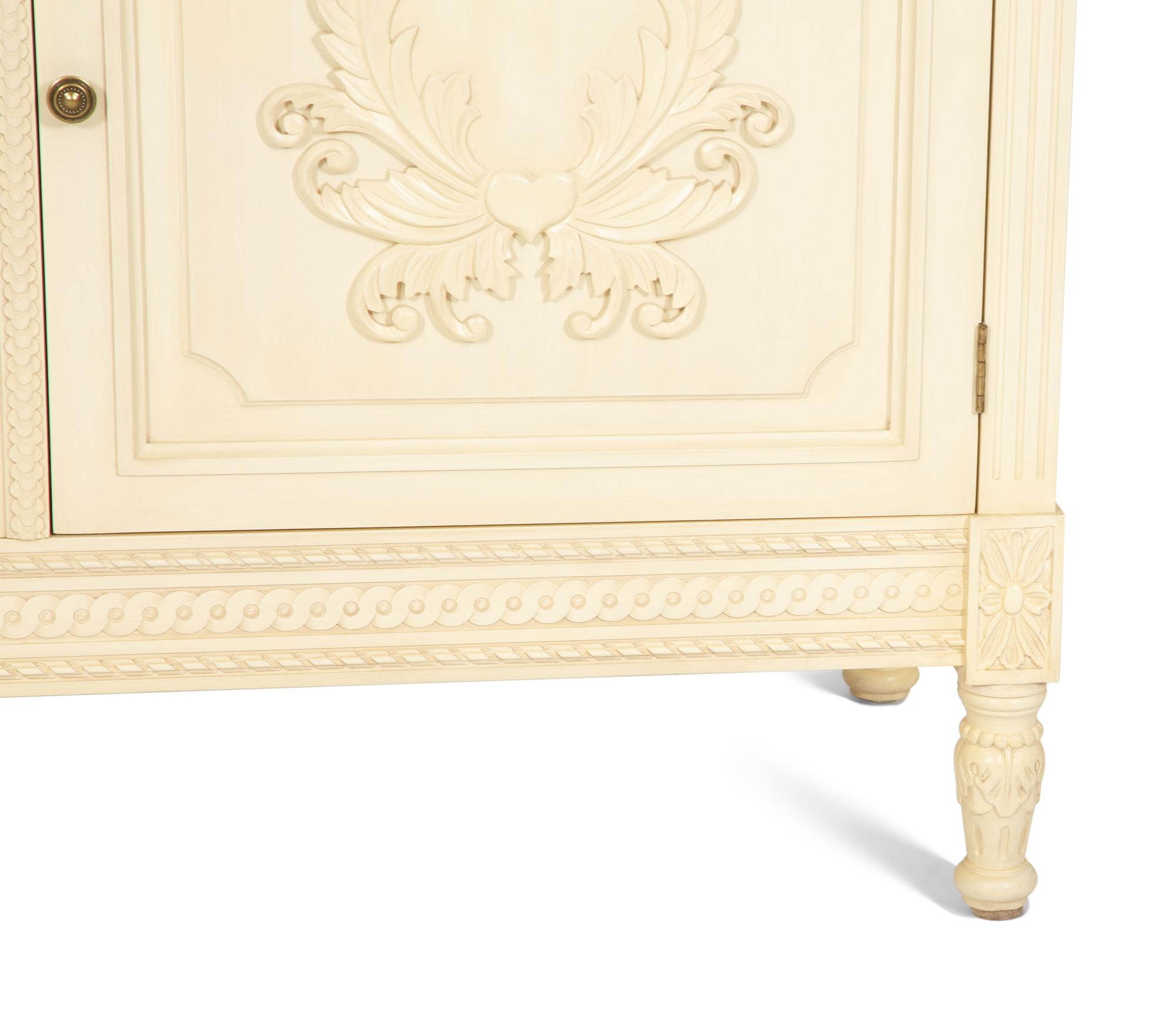 A Louis XVI Style White Painted Four-Door Armoire by Julia Gray, New York