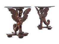 A Pair of Continental Baroque Style Carved Walnut Griffin Tables