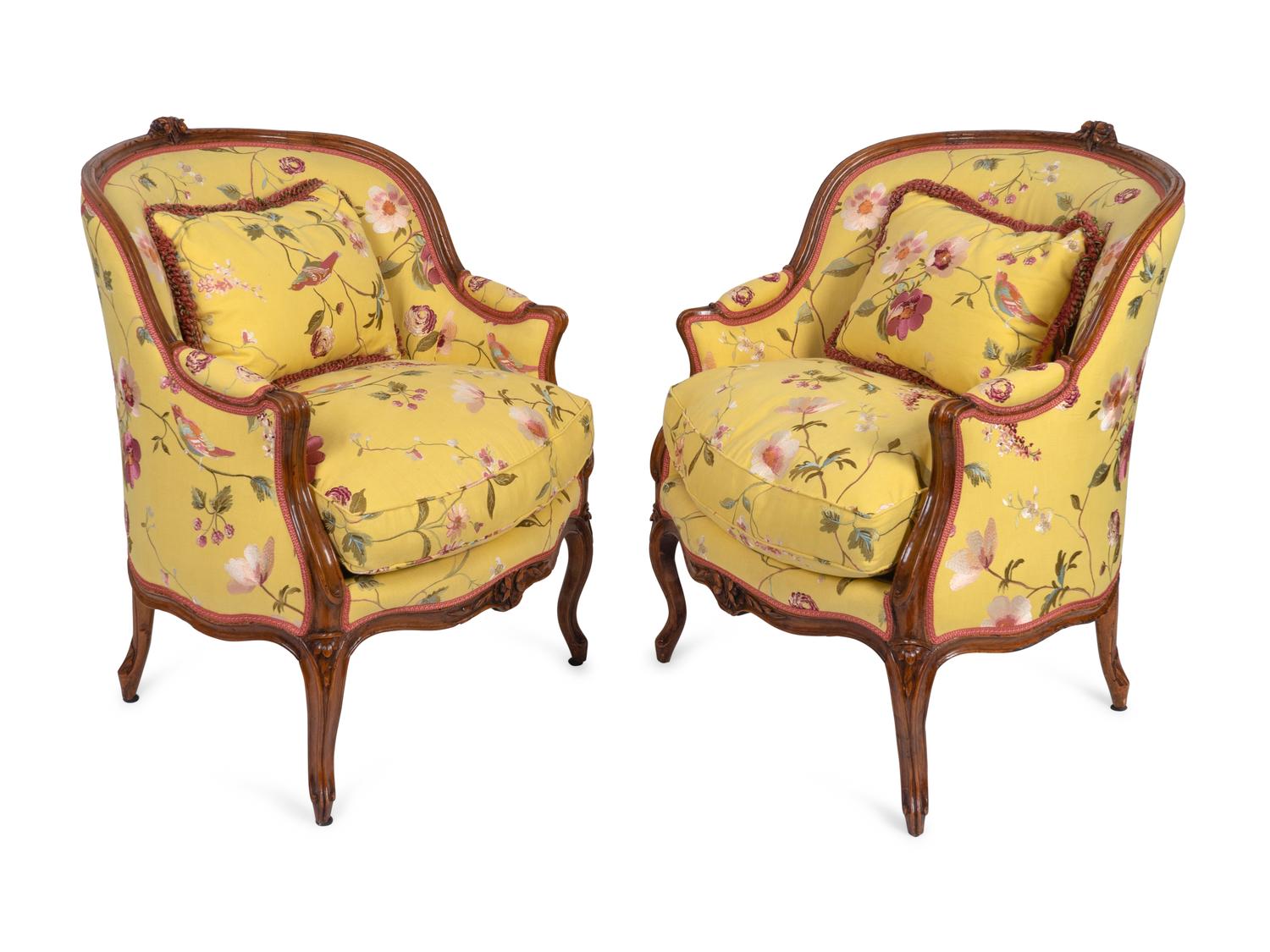 A Pair of Louis XV Style Carved Mahogany Bergères — 20TH CENTURY