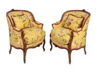A Pair of Louis XV Style Carved Mahogany Bergères — 20TH CENTURY