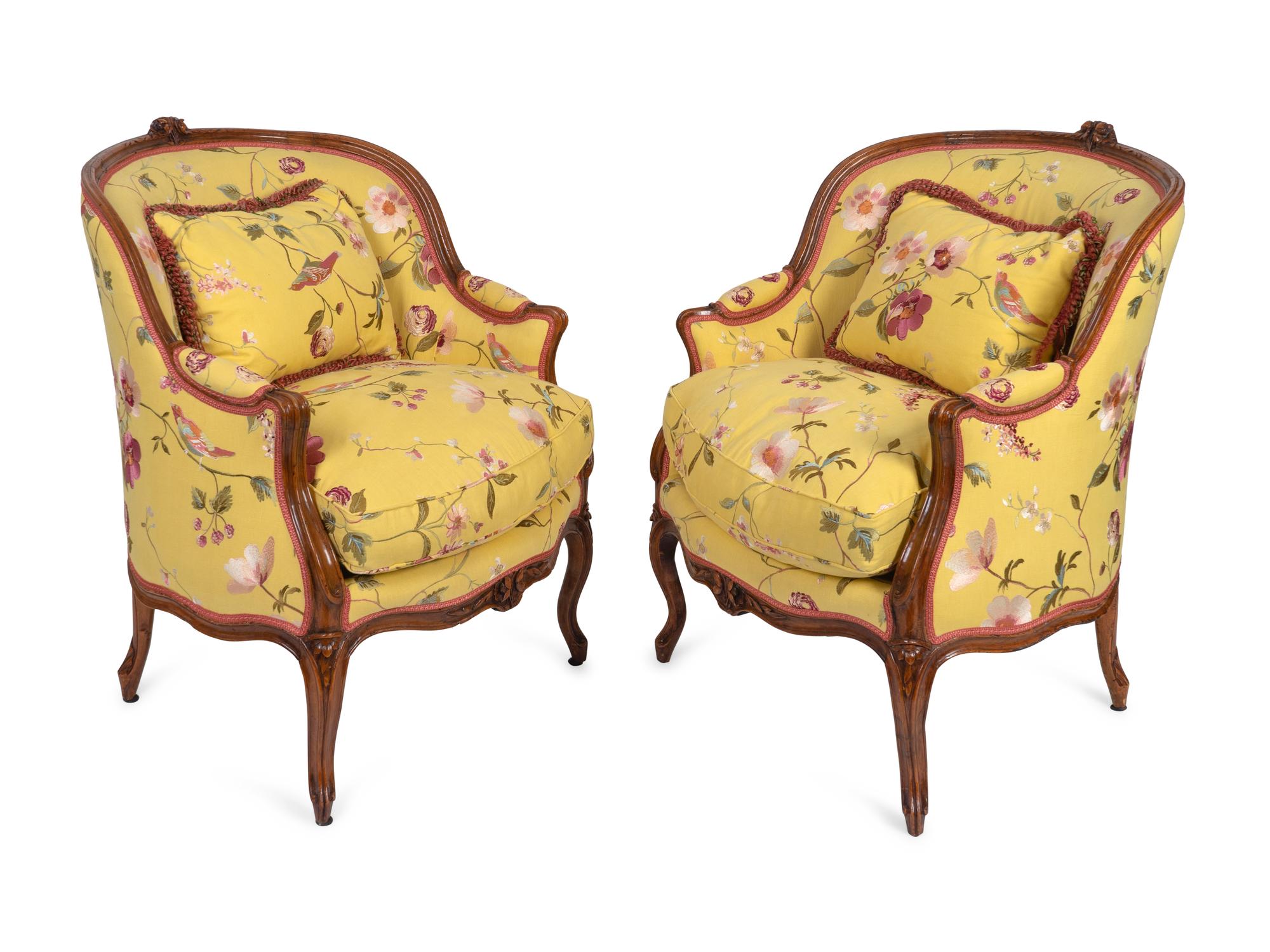 A Pair of Louis XV Style Carved Mahogany Bergères — 20TH CENTURY