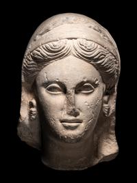 A Greek Limestone Head of a Woman