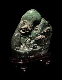 A Chinese Carved Spinach Jade 'Landscape' Boulder