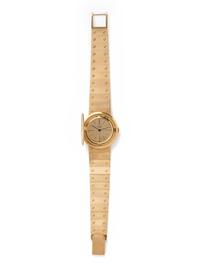 PIAGET, REF. 950 18K YELLOW GOLD AND COIN SURPRISE WRISTWATCH