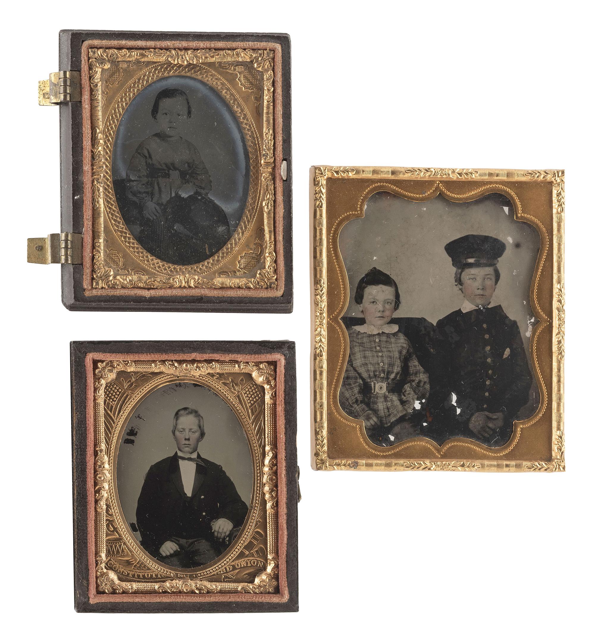 [EARLY PHOTOGRAPHY]. A group of 24 daguerreotypes, ambrotypes, tintypes, and CDVs of children of varying ages, incl. a young boy posed with his dog.