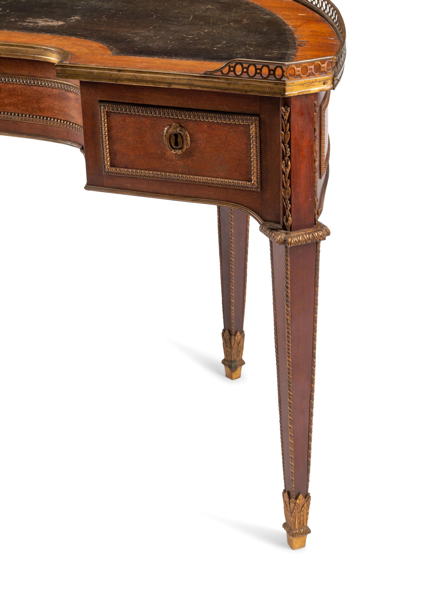 A Louis XVI Gilt Bronze Mounted Parquetry Demilune Writing Table