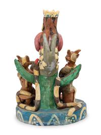 A Mexican Folk Art Polychrome Decorated Figural Group
